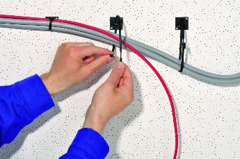bases sujetacables para atornillar paea organizar cables en pared - Serie QM de HellermannTyton