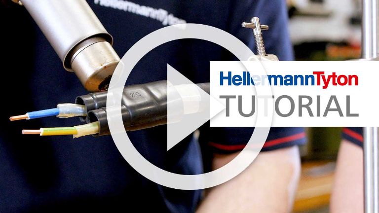 Sellado de Tubos Termoretráctiles HellermannTyton con adhesivo de fusión en caliente.